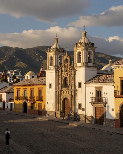 Quito's UNESCO colonial old town at golden hour with baroque churches and Andes mountain backdrop
