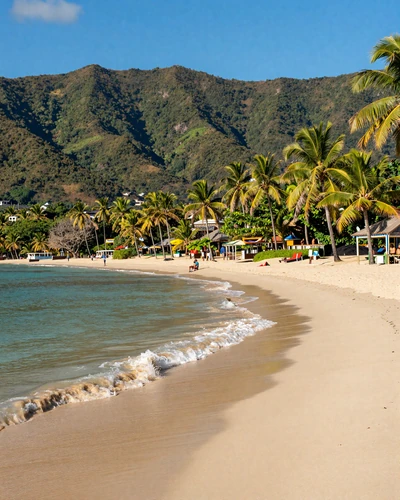 Maracas Bay beach in Trinidad with turquoise Caribbean water and the Northern Range mountains